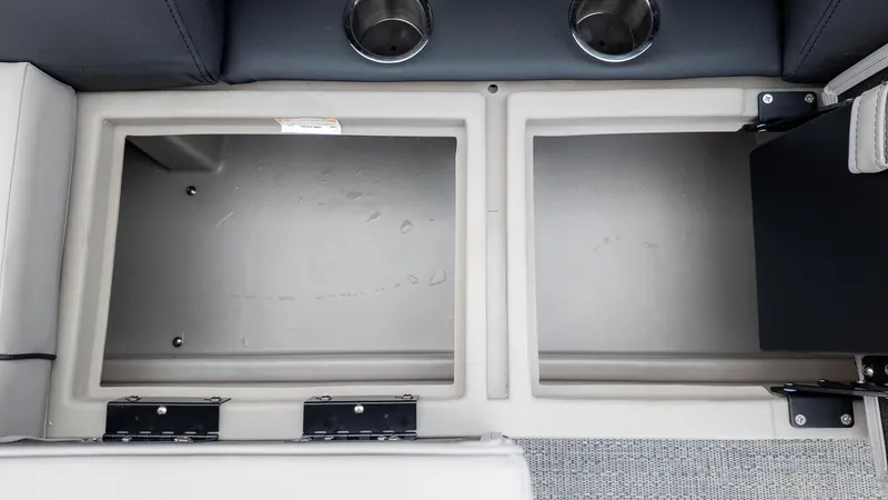 Slide: The Image of Storage compartments in the Barletta Aria A22CC boat. - 12