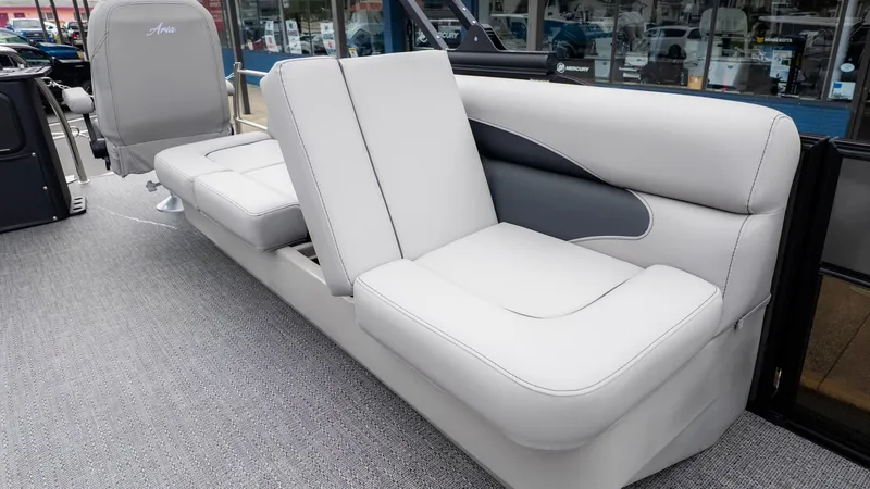 Slide: The Image of The image shows the interior of a 2026 Barletta Aria A22CC with gray upholstered seating. - 11