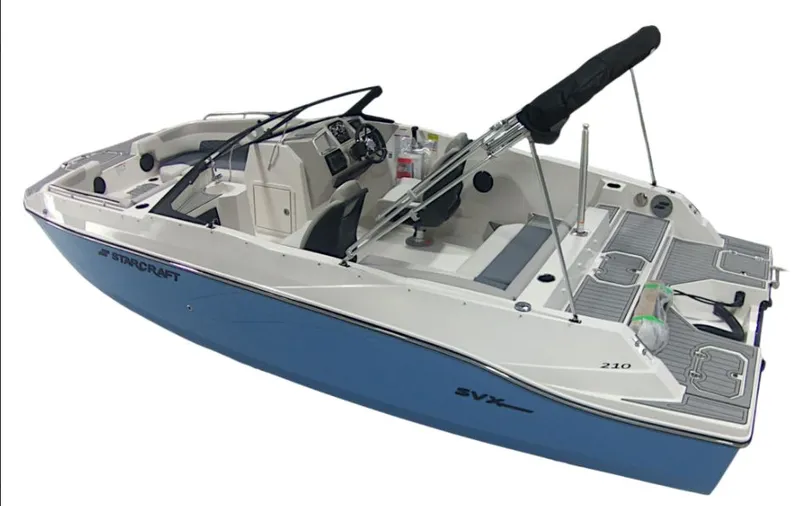 The Image of The image shows a 2027 Starcraft SVX 210 OB boat with a blue hull and black sunshade. - 1