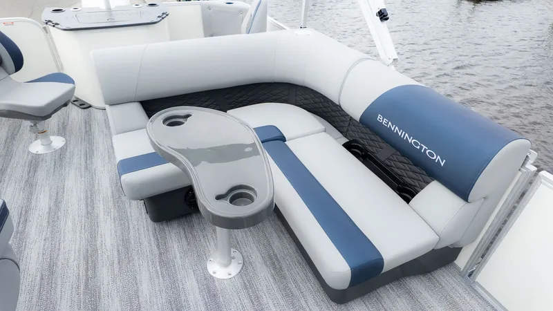 Slide: The Image of Interior view of a Bennington 21 S Fish and Cruise boat with gray and blue seating. - 9