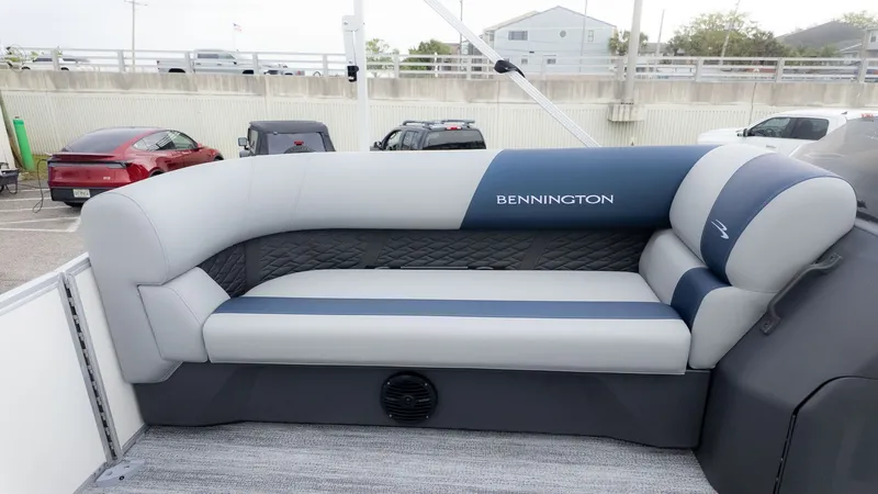 Slide: The Image of Interior view of a Bennington 21 S Fish and Cruise boat with gray and blue seating area. - 15