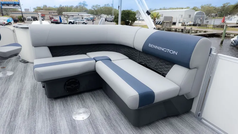 Slide: The Image of 2026 Bennington 21 S Fish and Cruise with sleek gray and blue seating on a boat. - 6