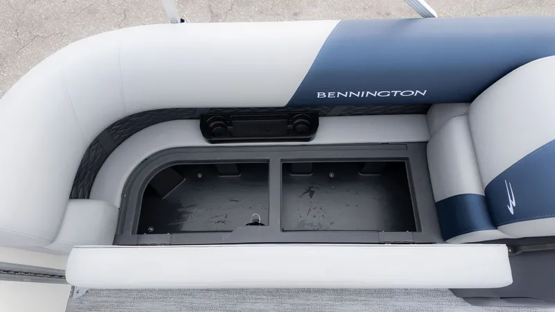 Slide: The Image of Seating area of a Bennington 21 S Fish and Cruise with storage underneath. - 16