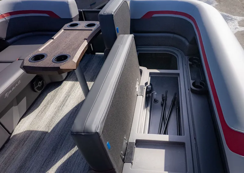 Slide: The Image of Interior of a Bennington 22 S Swingback with seating and storage compartment. - 15