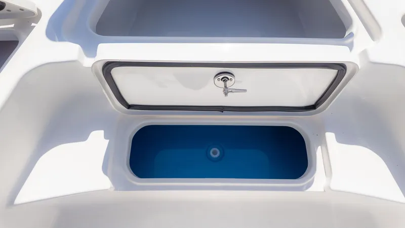 Slide: The Image of The image shows an open storage compartment on a boat with a blue interior. - 10