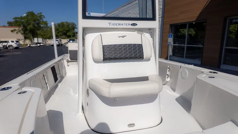 Slide: The Image of The image shows the cockpit of a 2026 Tidewater 2110 Bay Max boat. - 13