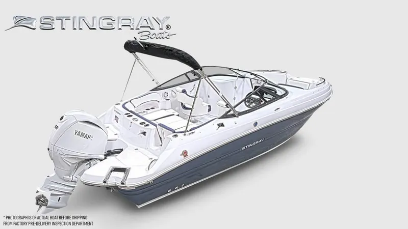 Slide: The Image of Stingray 211 DC boat from 2027 with Yamaha outboard motor, white and blue, on gray background. - 5