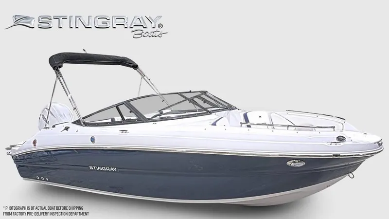 Slide: The Image of Stingray 211 DC boat from 2027 with a blue hull and black canopy. - 9