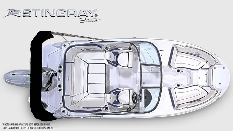Slide: The Image of Top view of a modern Stingray 211 DC boat with sleek design and comfortable seating. - 5