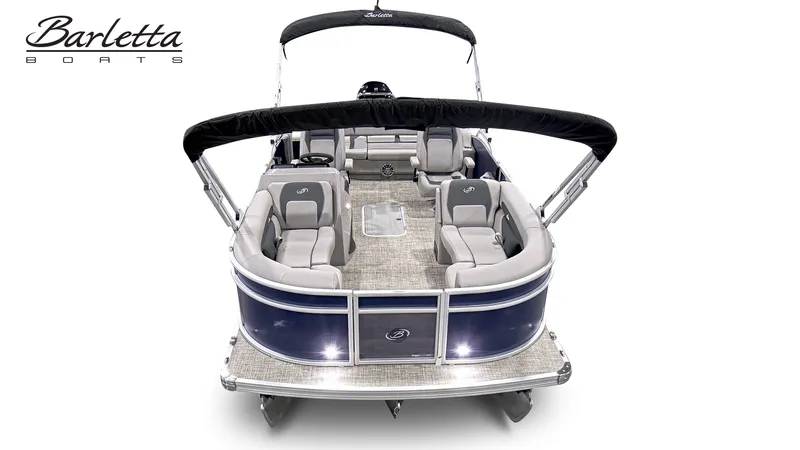 Slide: The Image of The image shows a Barletta A22UC pontoon boat with gray seating and a black sunshade. - 4