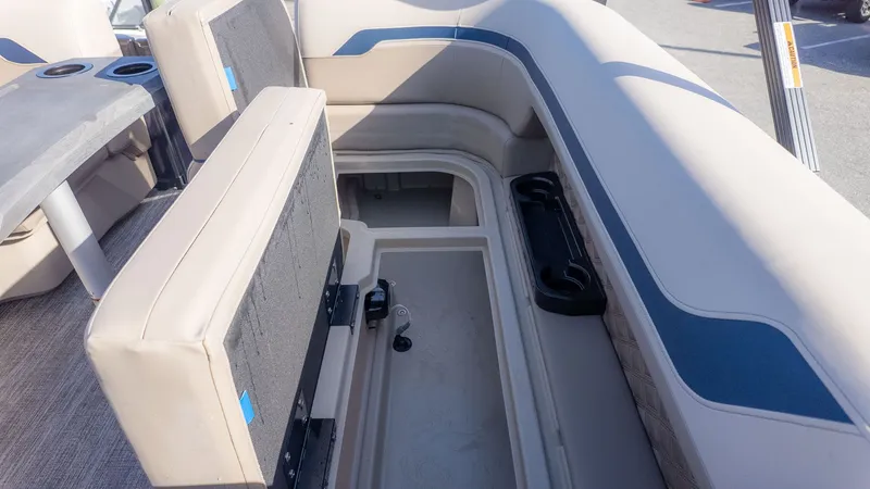 Slide: The Image of Interior view of a Bennington 22 S STERN RADIUS boat with seating area and storage. - 17