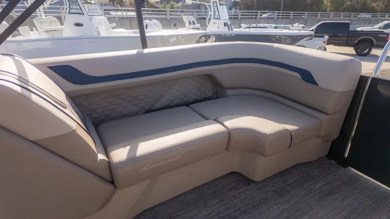Slide: The Image of Luxurious beige seating on a modern boat, featuring blue accents and quilted pattern. - 6