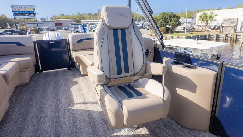 Slide: The Image of A luxurious seat on a Bennington 22 S STERN RADIUS boat, surrounded by elegant details. - 9
