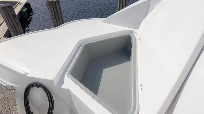 Slide: The Image of Close-up of a white boat deck with a built-in storage compartment. - 3