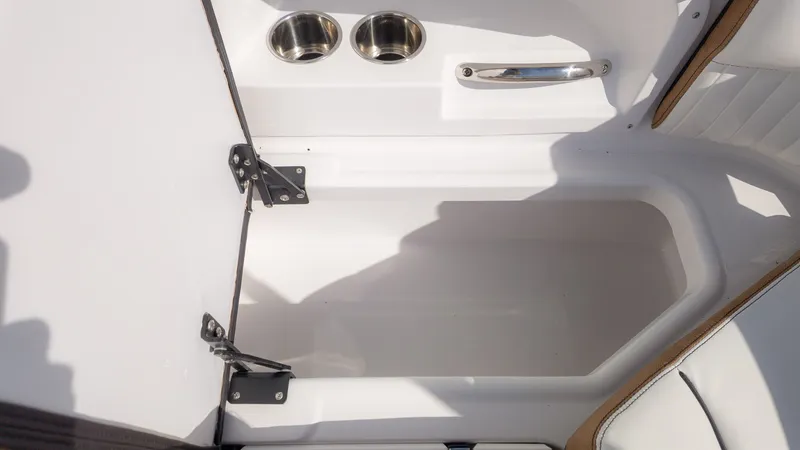 Slide: The Image of Interior of the Stingray 231 DC with cup holders and storage space. - 8