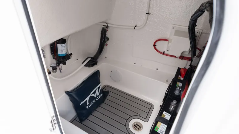 Slide: The Image of Interior of a Tidewater 210 LXF with batteries and wiring. - 18
