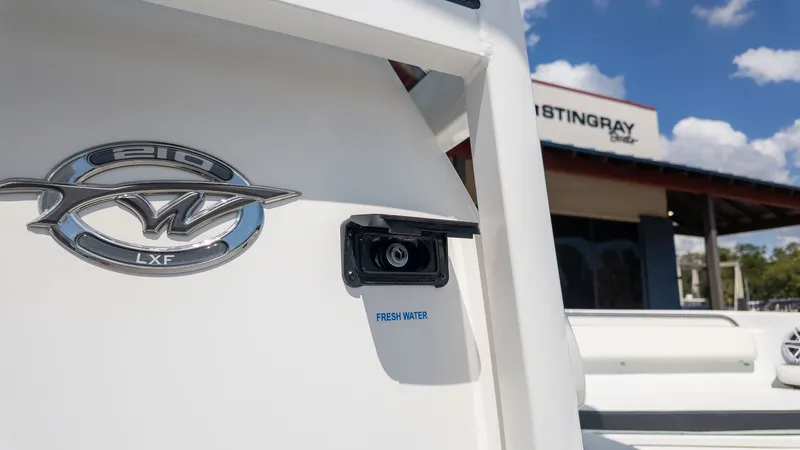 Slide: The Image of Close-up of the 2027 Tidewater 210 LXF with a fresh water connection. - 9