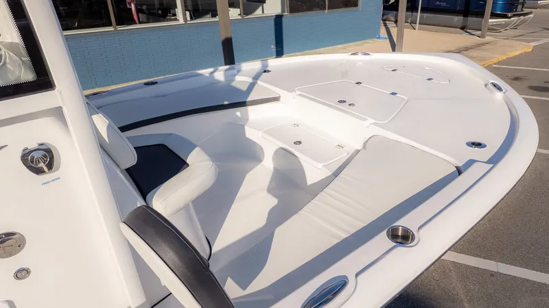 Slide: The Image of The image shows the deck of a 2026 Tidewater 2210 Carolina Bay boat. - 11