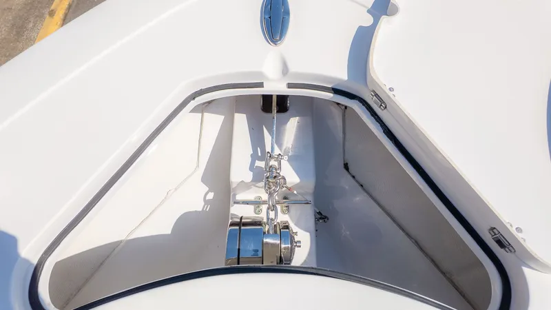 Slide: The Image of Close-up of the anchor locker on a 2014 Sportsman 251 Heritage boat. - 16