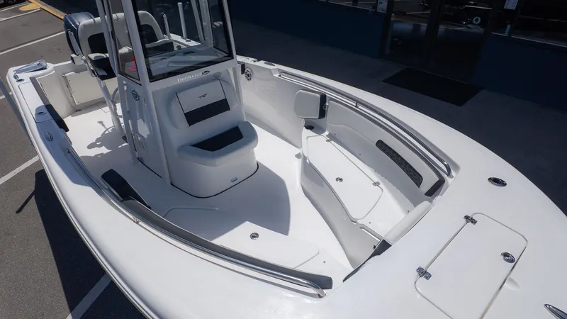 Slide: The Image of Tidewater 220 CC Adventure 2026: Spacious, modern deck with seating and storage. - 10