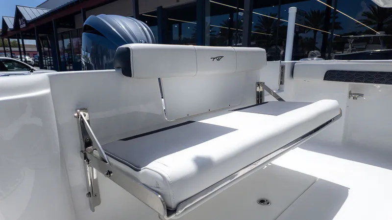 Slide: The Image of The 2026 Tidewater 220 CC Adventure features a foldable bench seat in the rear area. - 4