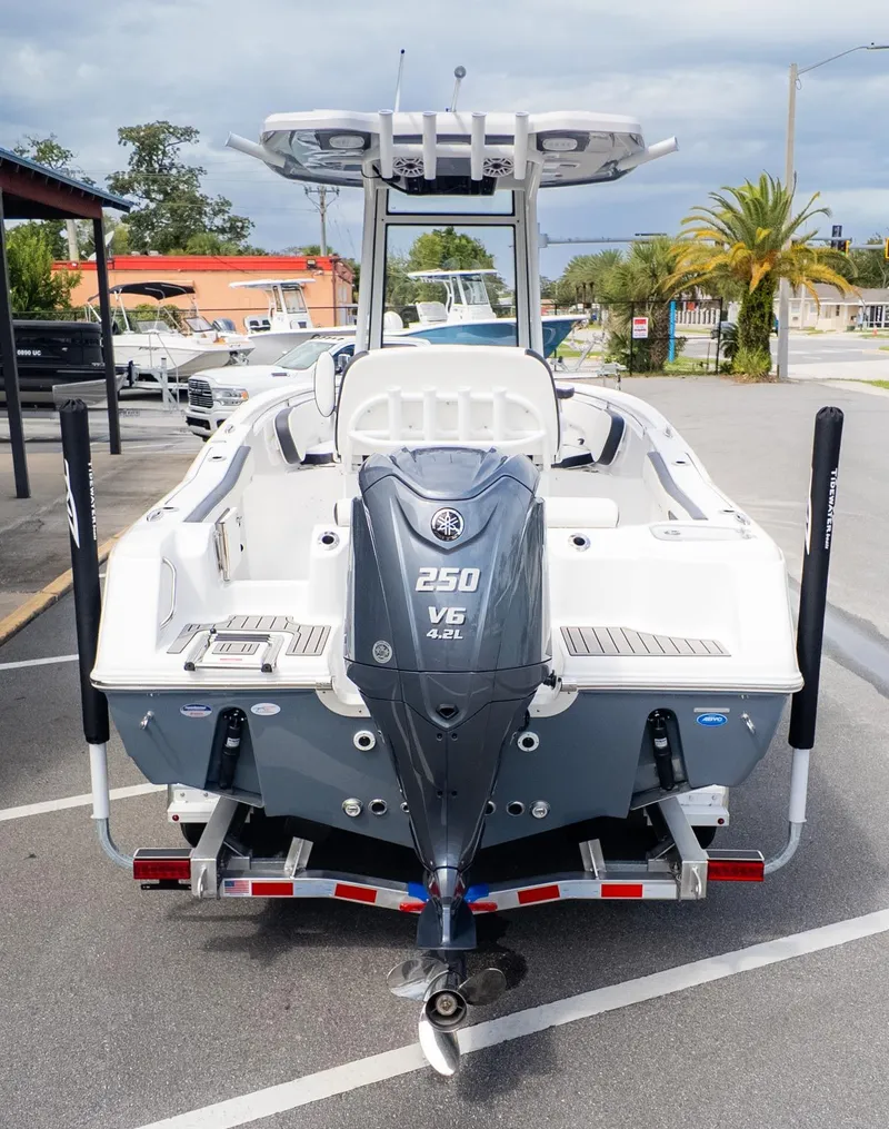 Slide: The Image of The image shows a 2026 Tidewater 220 CC Adventure boat with a 250 HP V6 engine. - 3