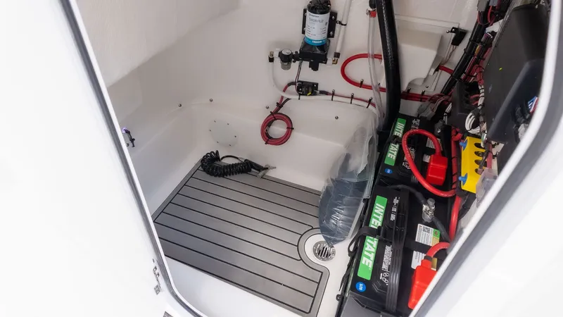 Slide: The Image of Interior of a boat with batteries and wiring. - 19
