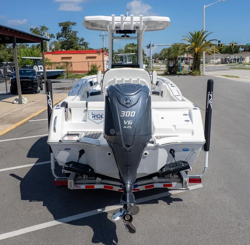 Slide: The Image of Rear view of a Tidewater 232 LXF boat with a 300 HP Yamaha engine. - 3