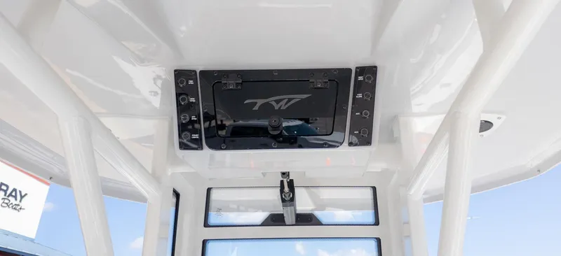 Slide: The Image of The image shows a boat's roof with a built-in compartment and a TW logo. - 10