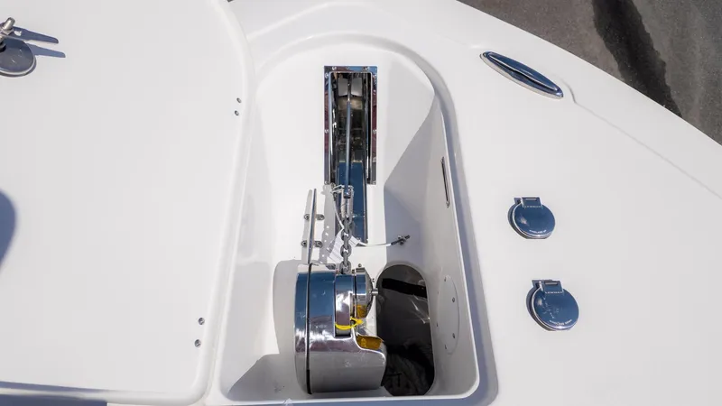 Slide: The Image of Close-up of an anchor locker on a boat with shiny metal fittings. - 16