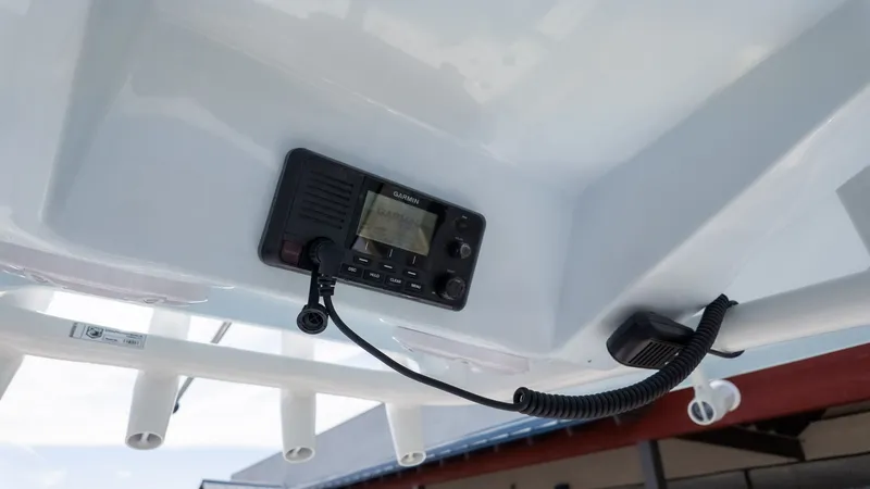Slide: The Image of A communication device is mounted on the ceiling of a boat. - 11
