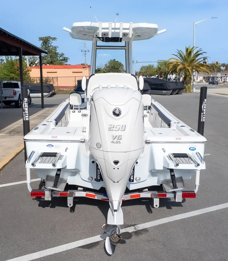 Slide: The Image of The image shows a 2026 Tidewater 2300 Carolina Bay boat on a trailer. - 4