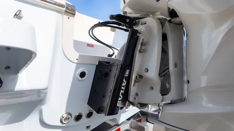 Slide: The Image of Close-up of a boat's outboard motor with hydraulic lift system. - 3