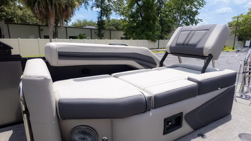 Slide: The Image of The image shows the luxurious interior of a 2025 Barletta Corsa 23M boat. - 13
