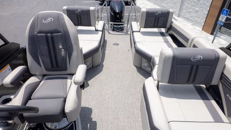 Slide: The Image of Interior view of a Barletta Corsa 23M pontoon boat with gray and white seating. - 12