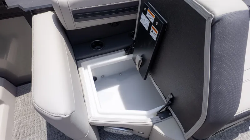 Slide: The Image of Seating area with built-in storage on a Barletta Corsa 23M boat. - 14