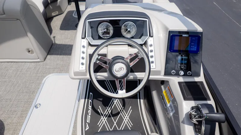 Slide: The Image of The cockpit of the 2025 Barletta Corsa 23M with a modern steering wheel and instruments. - 30