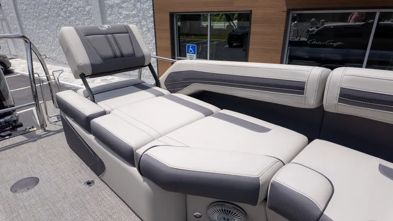 Slide: The Image of The image shows the lounge seating of a 2025 Barletta Corsa 23M boat. - 16