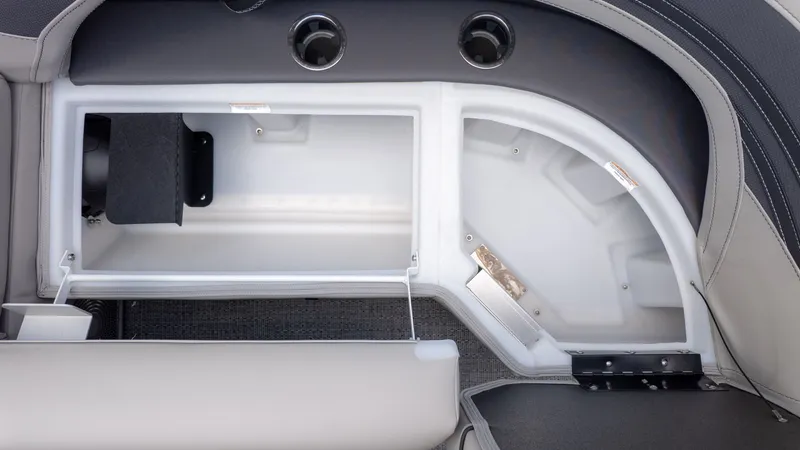 Slide: The Image of Interior view of a Barletta Corsa 23M boat with storage compartment and cushioned seating. - 22