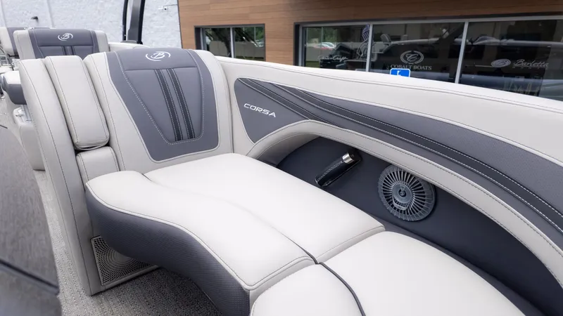 Slide: The Image of Interior of a 2025 Barletta Corsa 23M with sleek gray and white upholstery. - 21