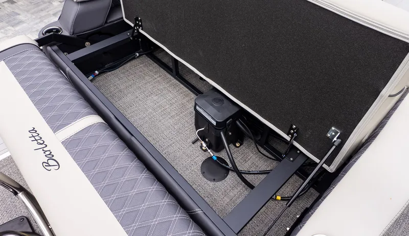 Slide: The Image of 2025 Barletta LUSSO 25U with open seating area, showing storage and cables. - 7