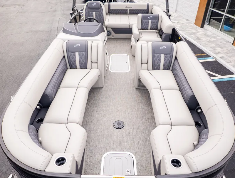Slide: The Image of The image shows the interior of a Barletta LUSSO 25U boat with luxurious seating. - 17