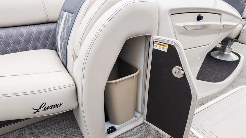 Slide: The Image of Interior of the Barletta LUSSO 25U with seating and storage compartment. - 18