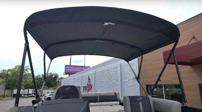 Slide: The Image of The image shows the canopy of a 2025 Barletta LUSSO 25U boat. - 25
