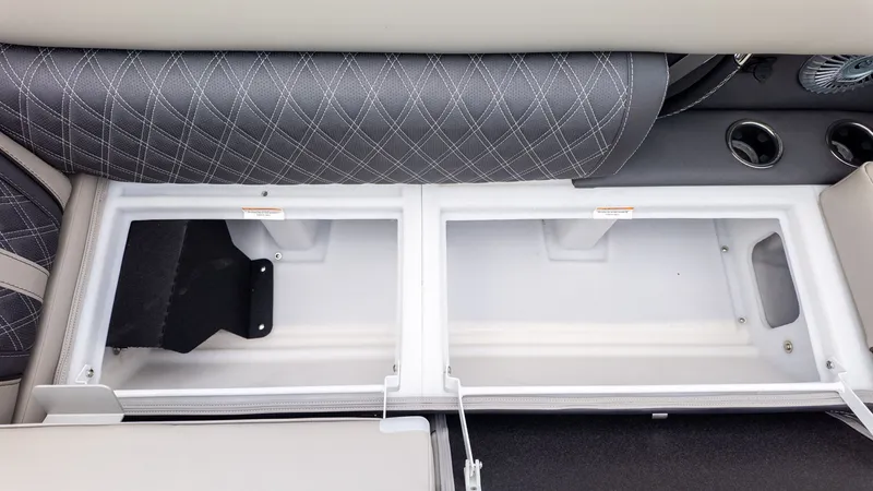 Slide: The Image of Interior view of a Barletta LUSSO 25U boat with storage compartments under the seats. - 13