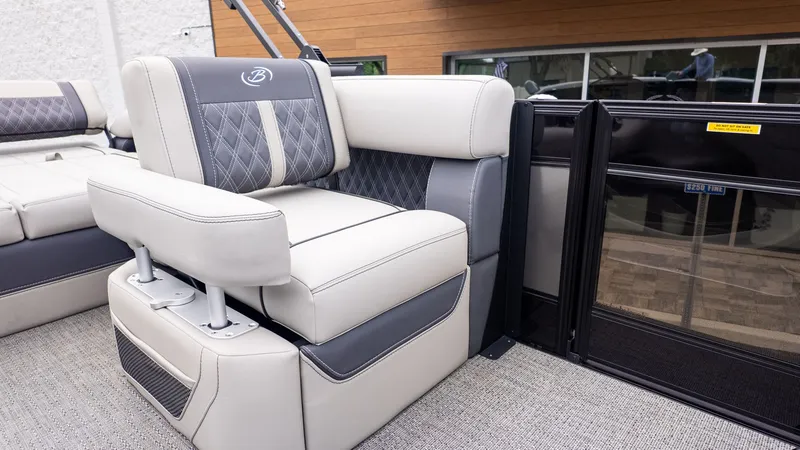 Slide: The Image of Luxurious seating area on a Barletta LUSSO 25U pontoon boat, featuring elegant upholstery and modern design. - 9