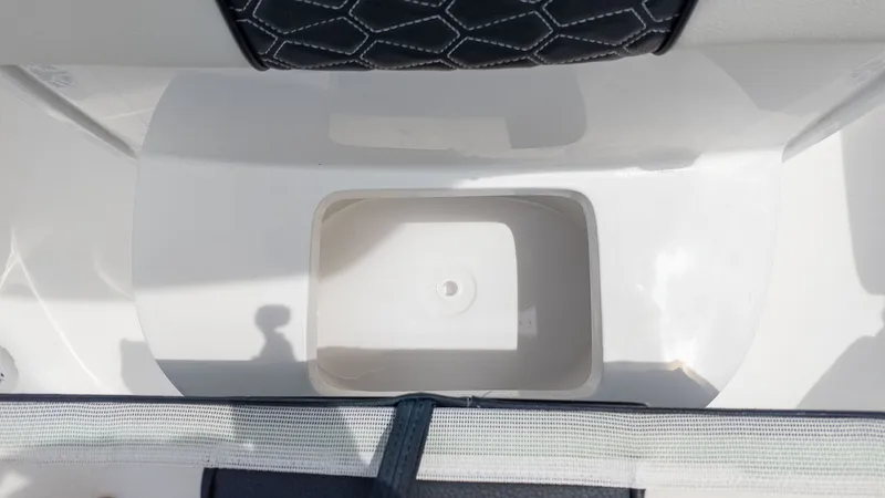 Slide: The Image of Close-up of a white boat cooler with padded edging. - 15