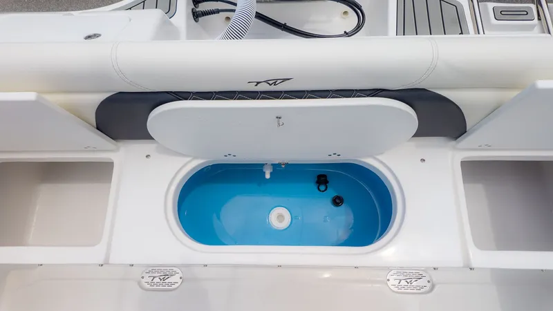 Slide: The Image of The image shows the interior of a boat with a blue livewell. - 8