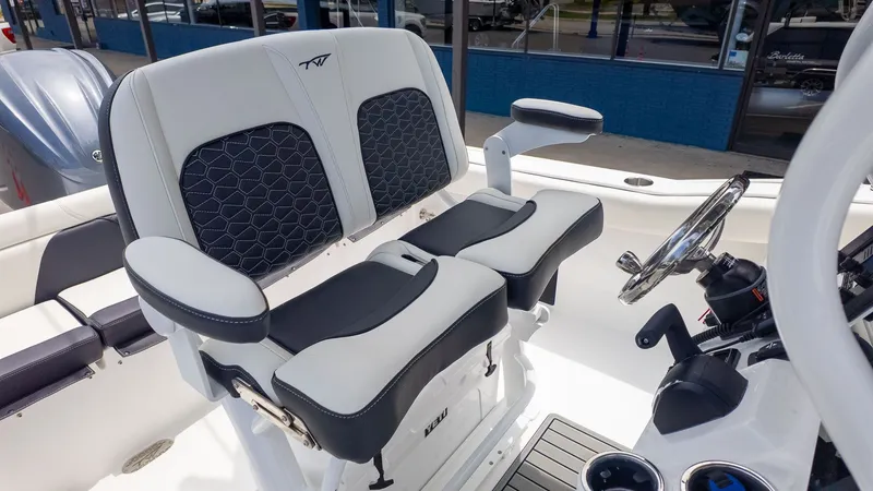Slide: The Image of The boat seats are modern and cushioned, featuring armrests and a stylish design. - 15