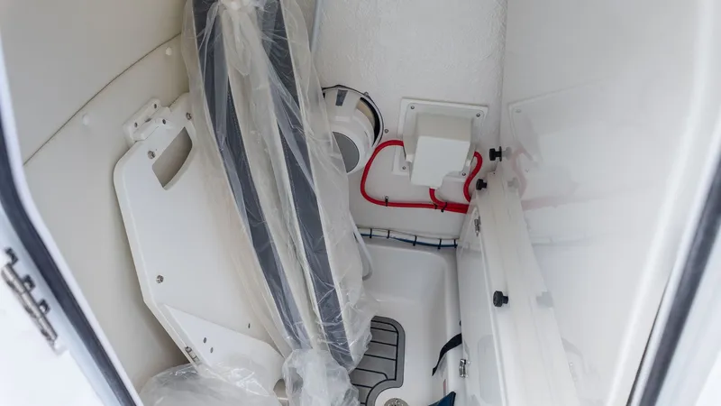 Slide: The Image of Interior of a boat with plastic covering and cables. - 17